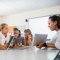 Teachers and students having a class remotely